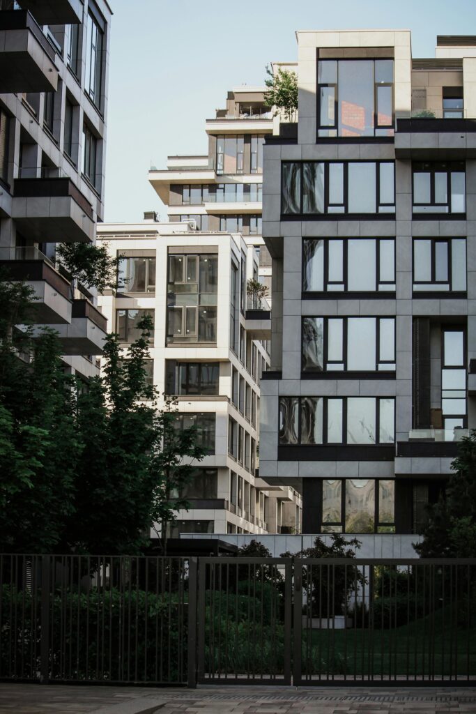 A view of contemporary buildings with minimalist design in an urban setting.
